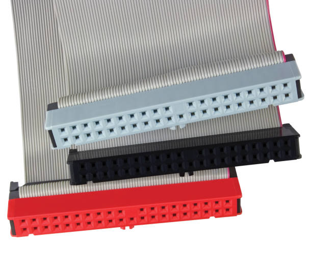 istock IDE connectors ribbon cables for PC computer HDD hard drive, isolated red, grey, black, large detailed macro closeup studio shot 1289529067