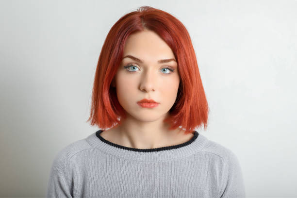 istock Young woman looking at camera 1289529348