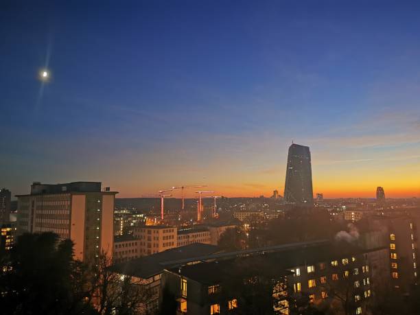 istock The ECB in Frankfurt with illuminated construction cranes 1289530545