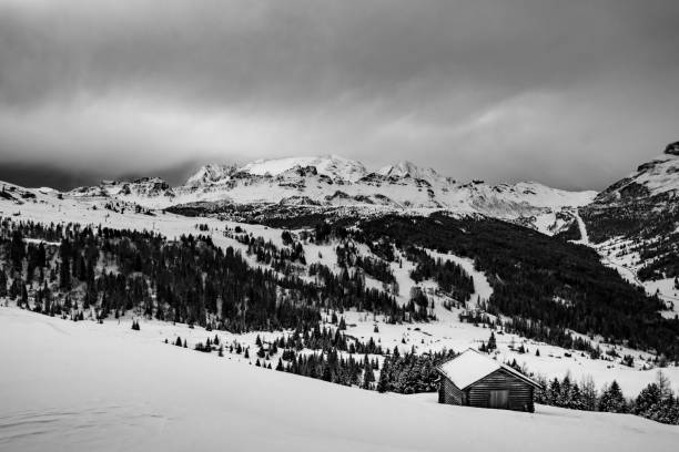 istock Stormy clouds in italian dolomites in a snowy winter 1289530718