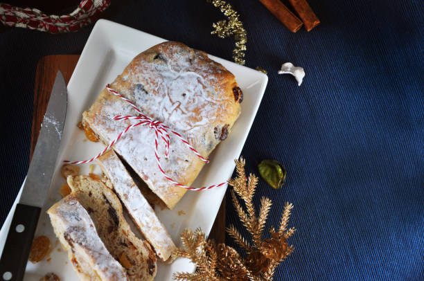 istock Top view of Stollen Cake Dish on Dark Blue Background 1289531359