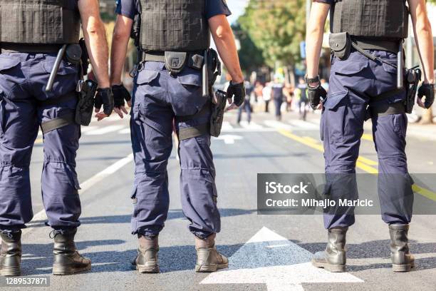 Police Officers On Duty During Street Protest Stock Photo - Download Image Now - Police Force, Police Brutality, Protest
