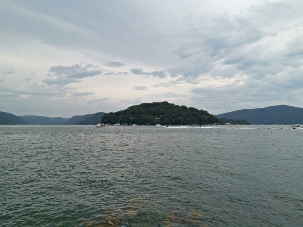 istock Beautiful view of a river on a cloudy day 1289543030