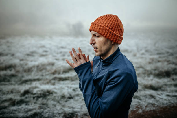 istock Young man starting training outdoor on cold weather 1289550881