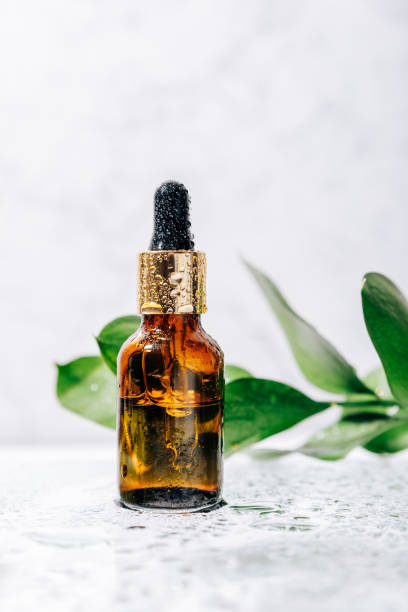 istock glass bottle with pipette with drops on it 1289553890