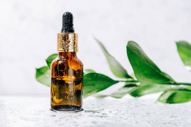 istock glass bottle with pipette with drops on it 1289553941
