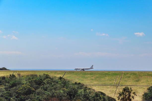istock Airplane taking off and landing in the meadow 1289553946