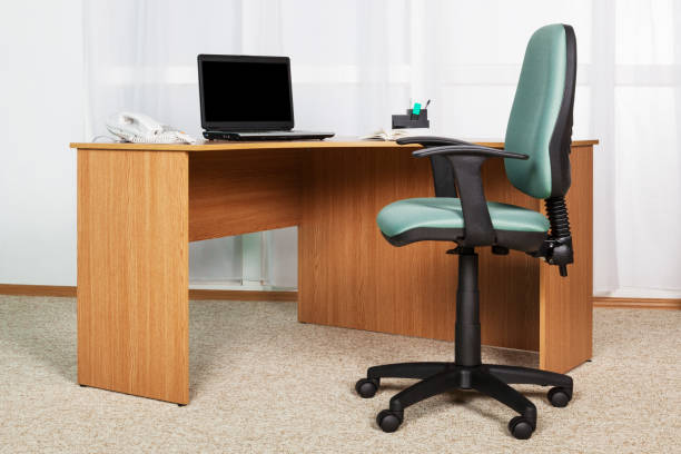 istock workplace with laptop in a modern office 1289553980