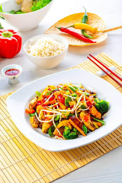 istock sweet and sour chicken with rice and vegetables 1289556783