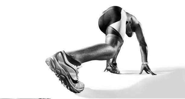 istock Sports background. Runner on the start. Black and white image isolated on white. 1289557588
