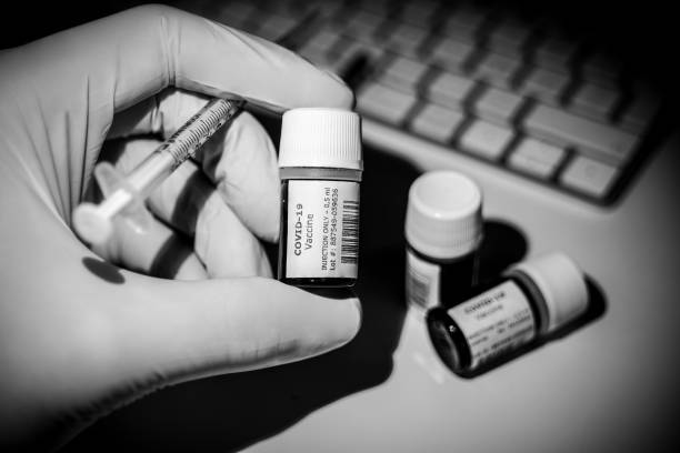 istock A creative image of some Covid-19 Vaccine bottles ready to be injected 1289560292