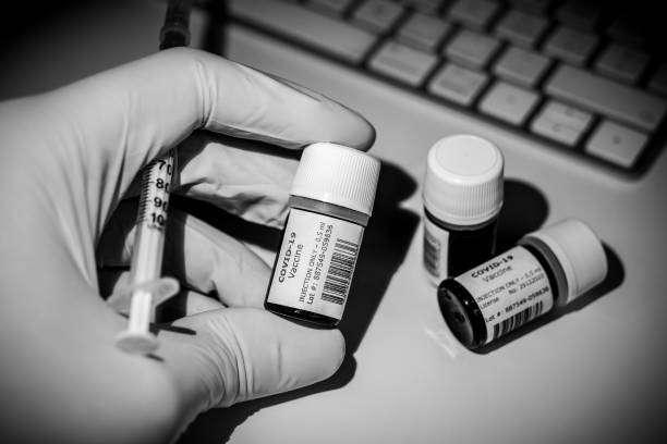 istock A creative image of some Covid-19 Vaccine bottles ready to be injected 1289560327