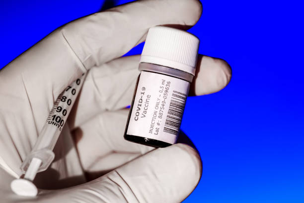 istock A creative image of a Covid-19 Vaccine bottle ready to be injected 1289560338