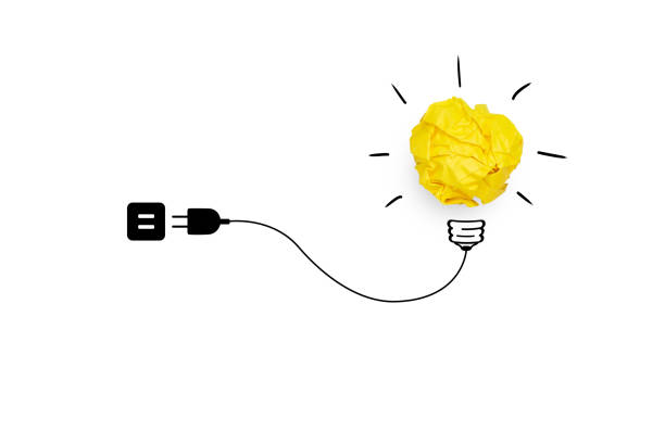 istock Creative idea, Inspiration, New idea and Innovation concept with Yellow crumpled paper light bulb, Wires and plugs, white background. 1289560591