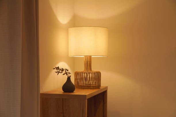 istock View of a cozy decorative corner with a table lamp spending warm light 1289561375