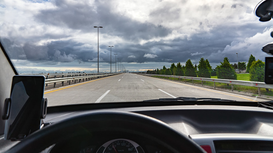 View of road from the car salon, driving auto