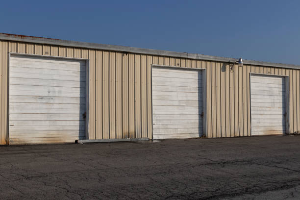istock Self storage and mini storage garage units deserted, cold, and abandoned. 1289570837