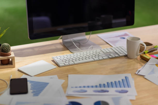 istock Business documents, financial statistics reports graphs and charts at the office 1289572194