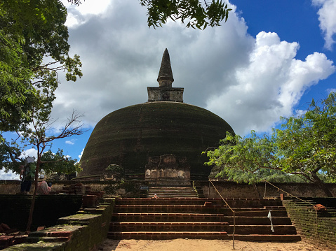 Polonnaruwa, Sri Lanka- January 28, 2017: Polonnaruwa, a marvel of a place, is in Northern Sri Lanka. The city once served as the capital of the Kingdom of Polonnaruwa under the Chola Empire in the 10th century. This makes it the second most historic kingdom in Sri Lanka after Anuradhapura. Here are the relics of the pagodas.