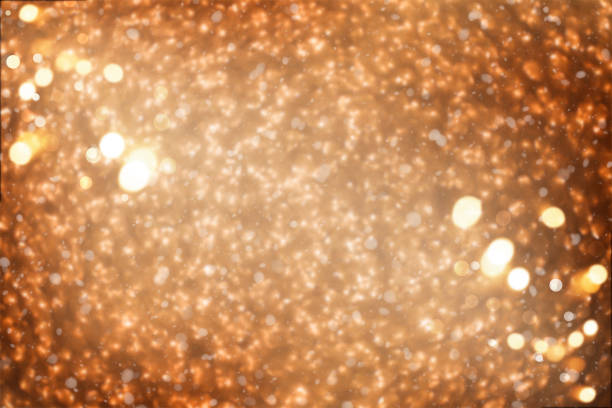istock Golden Glittering Defocused Lights Abstract Background 1289576056
