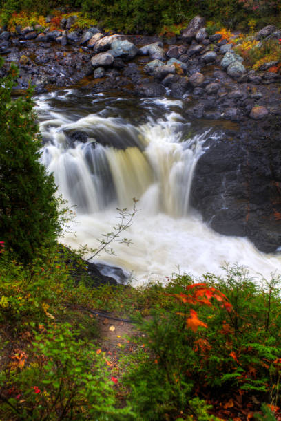 istock Vertical of Batchawana Falls in Ontario, Canada 1289579279