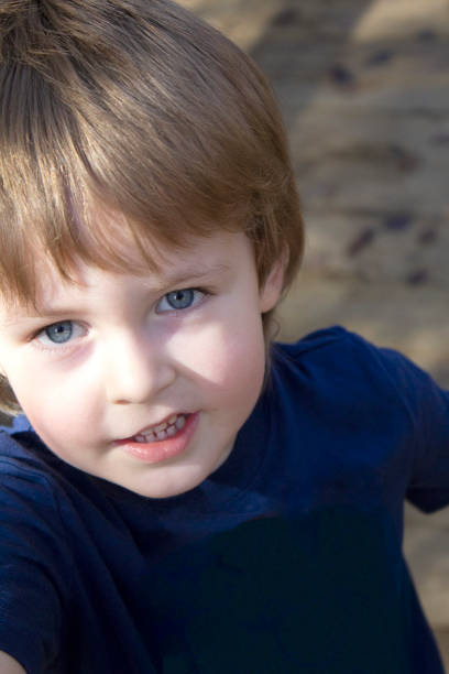 istock Little Boy Child Looking At Camera 1289580640