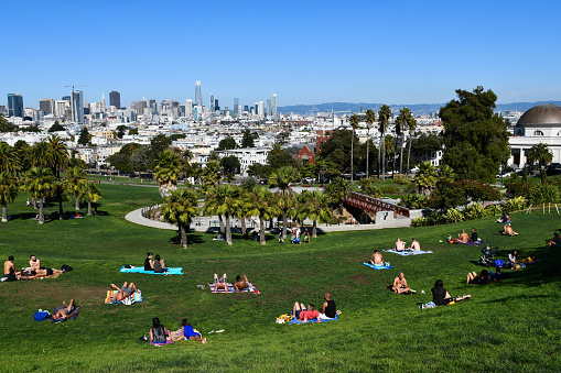 San Francisco, CA, USA - October 7, 2019: People relaxing in Dolores Park, one of the city's most popular parks.