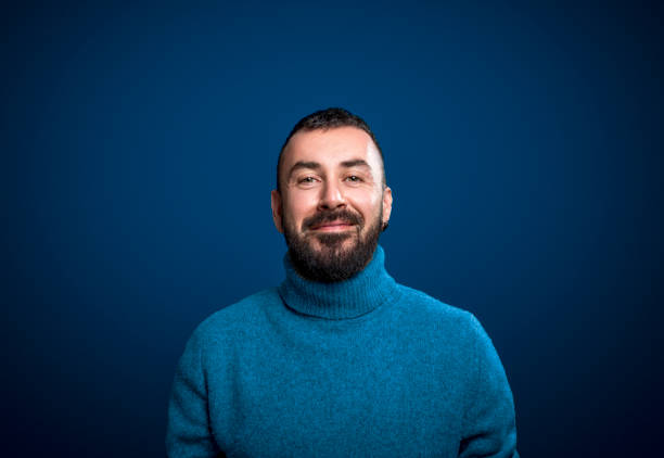 Portrait of happy man looking at camera