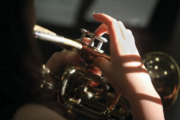 istock Student Musician Plays the Trumpet 1289581794