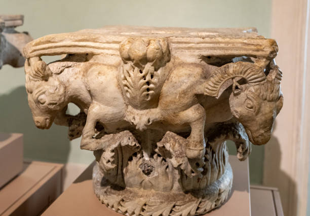 Decorative  marble capital / VI cent. / in the Archiepiscopal Museum (Italian: Museo Arcivescovile) in Ravenna, Italy, Ravenna, Italy - Sept 11, 2019: Decorative  marble capital / VI cent. / in the Archiepiscopal Museum (Italian: Museo Arcivescovile) in Ravenna, Italy, agnus dei stock pictures, royalty-free photos & images