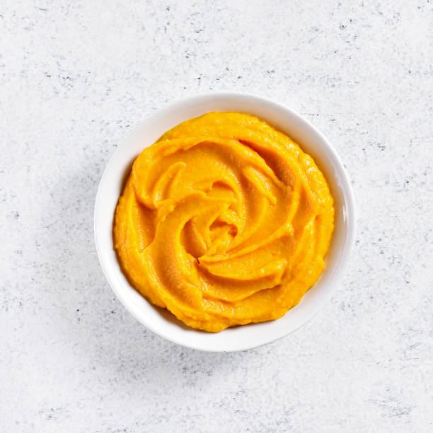 istock Pumpkin puree in bowl 1289583213