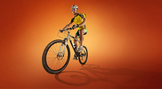 istock Sport. Athlete cyclists in silhouettes isolated on background with shadow 1289584322