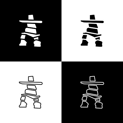 Set Inukshuk icon isolated on black and white background. Vector.