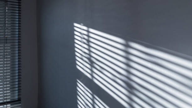 istock Shadow floor. Abstract light, black shadow overlay from window on white texture wall. Sunlight architecture background. Overlay effect for photo and design. 1289594044