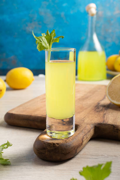 istock Traditional Italian liqueur Limoncello with cinnamon and celery 1289600422