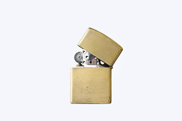 istock An old gasoline lighter in bronze color 1289601089