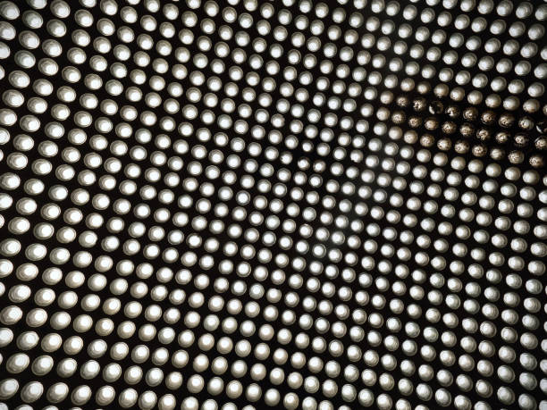 istock Ceiling of an industrial building with  glass ceiling. Circular glass bricks 1289602320