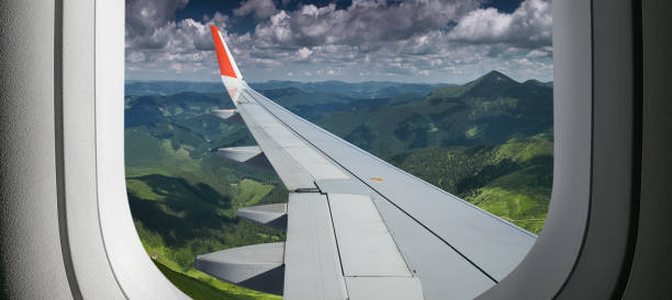 istock View from airplane. Flight window. Vacation destinations. Travel concept. 1289603246