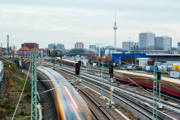 istock Berlin Skyline, Train Station, rail transport, motion blurred trains 1289604556