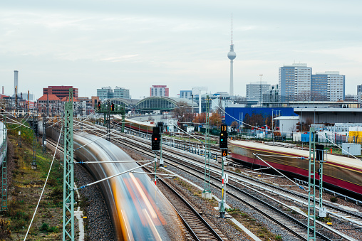 Berlin Skyline with Train Station and motion blurred Trains