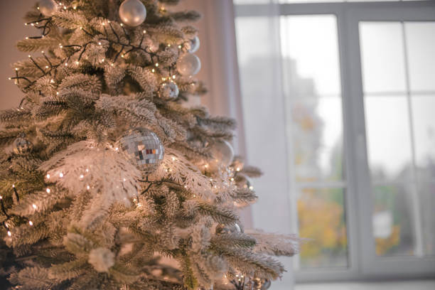 istock Christmas tree festively decorated with balls and toys 1289604759
