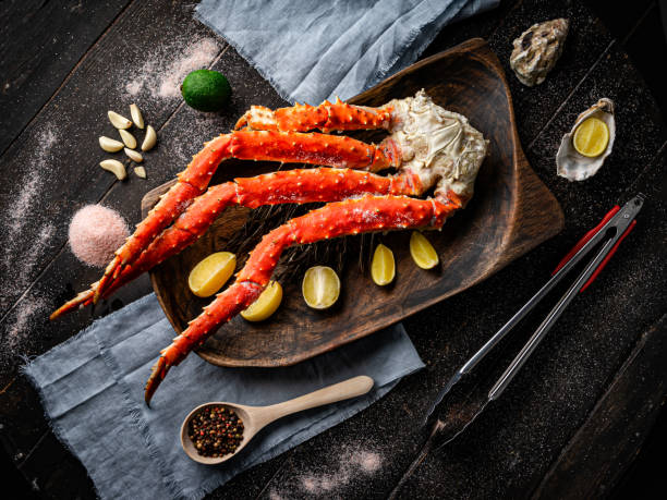 istock Fresh crab claws with lemon slices and spices 1289606810