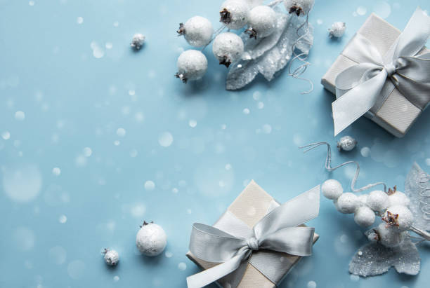 istock Frame made of white decorations on pastel blue background 1289610524