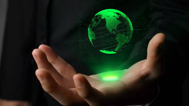 istock Human hand holding earth globe holographic technology 1289612298