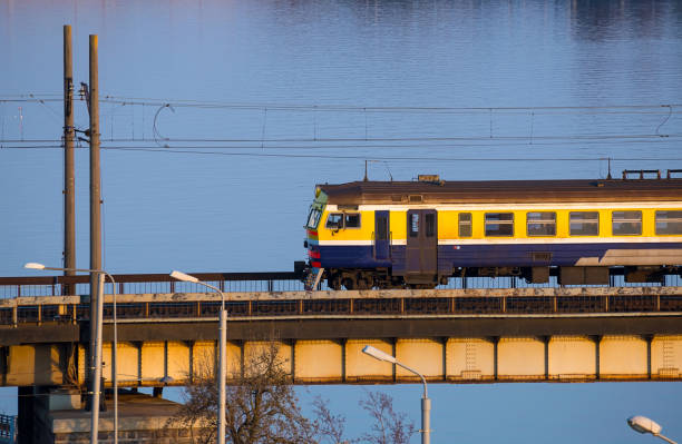 istock Electric train passing the bridge over Daugava in Riga 1289612972