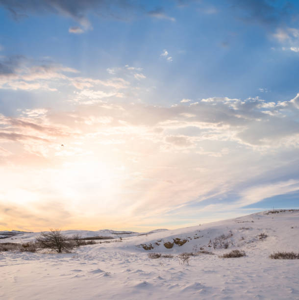 istock mountain in a snow at the sunset 1289616510