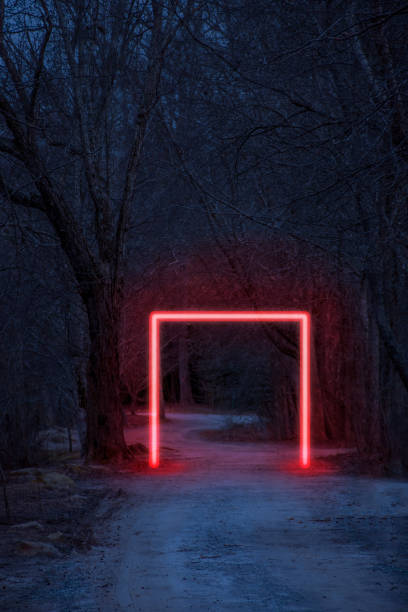 istock Red light of a box on a path going into the woods 1289616748