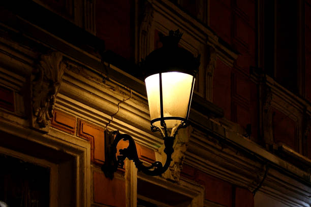 vintage lantern on the wall of an old building