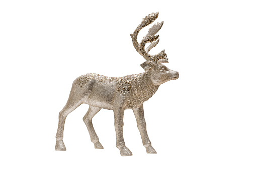Toy deer made from golden sequins isolated on white. New year or Christmas deer toy