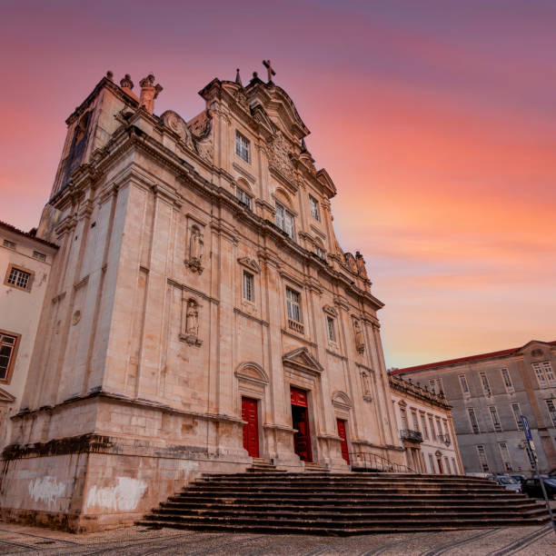 Sé Nova of Coimbra at twilight Twilight's red sky up on the "new cathedral" of the city of Coimbra, Portugal coimbra city stock pictures, royalty-free photos & images